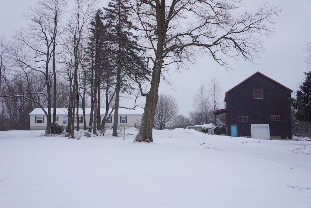 House with 3 story barn to store sleds and other equipment.