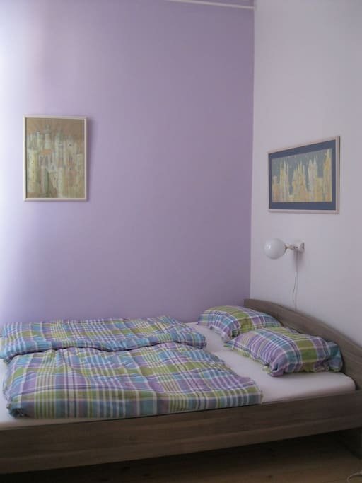 Purple room with queen bed