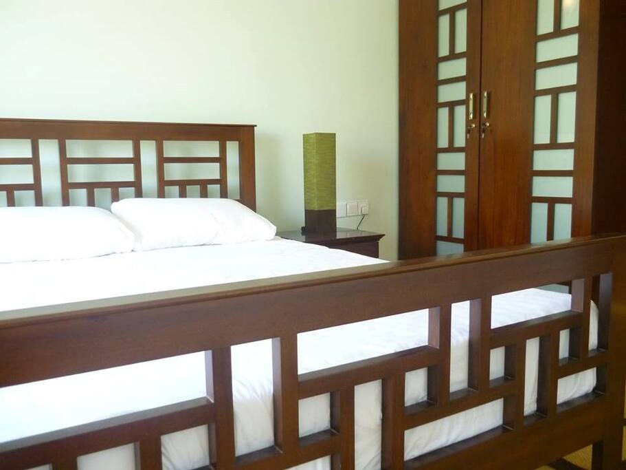 Mahogany furniture blended with a green touch