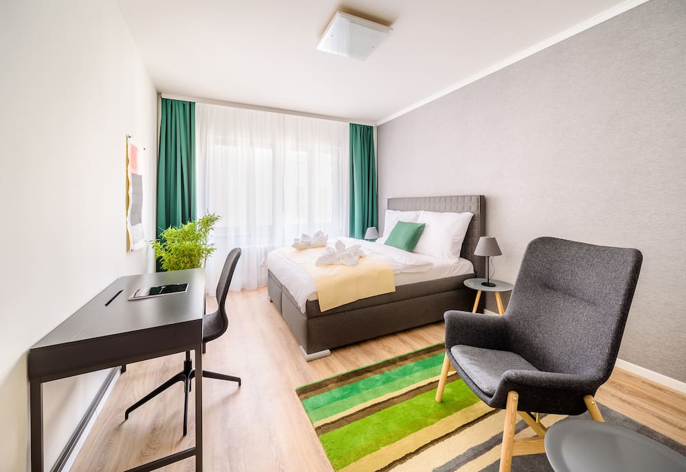 This is a master bedroom. Calming, spacious room with its own dressing room conveys a sense a luxury during your stay.