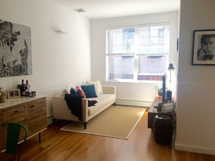 Sun-drenched living room, perfect for relaxing after a day of sightseeing!