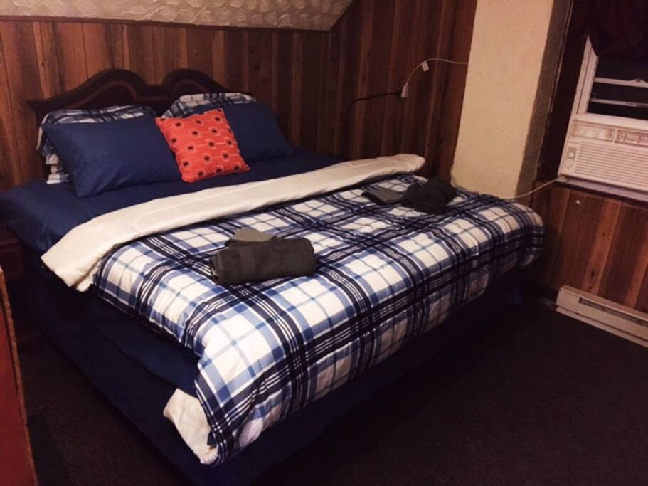 King bed room facing the window