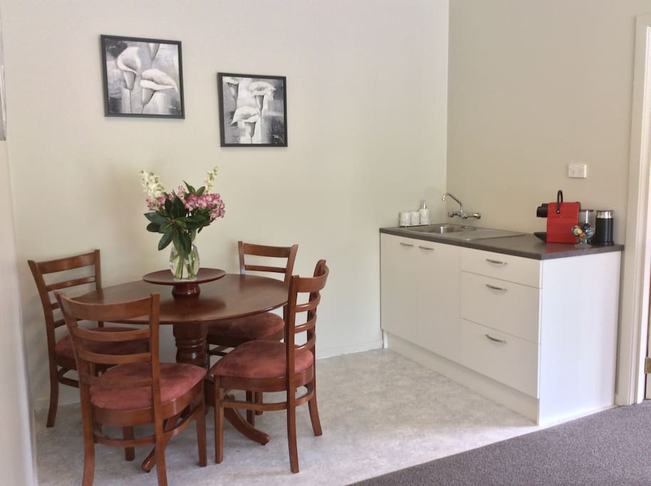 Kitchenette with Nespresso machine & dining table