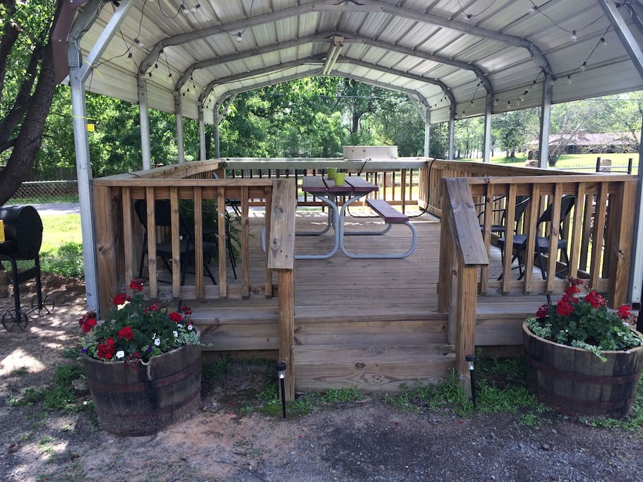 Covered outdoor
area to enjoy , also
grill and firepit.