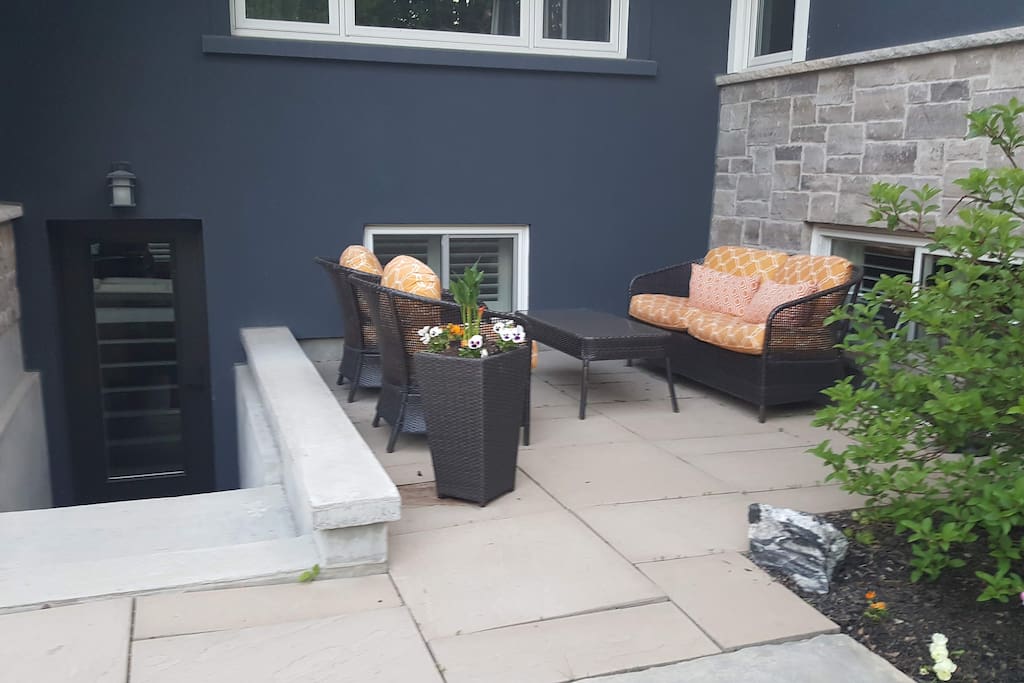 Private apartment entrance with access to patio