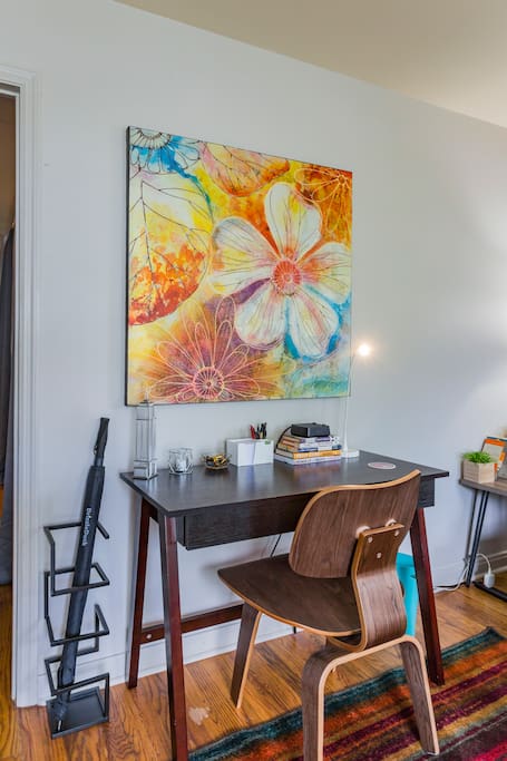 Comfortable working/desk space in living room, complete with charging station and supplies (pens, post-it notes, etc.). Wi-fi available throughout apartment.