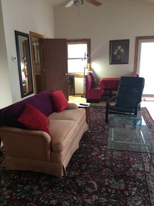 I've changed things up a bit with a new carpet and more comfortable couch.