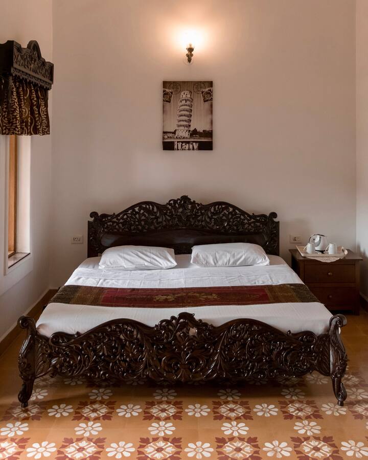 Sleep like a King! on our King Sized Bed, 
an antique which dates back over 40 years