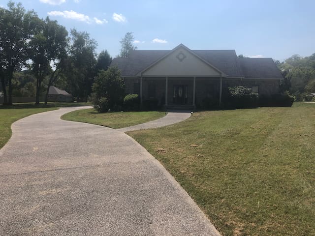 Private and modern family style home on 1 acre lot