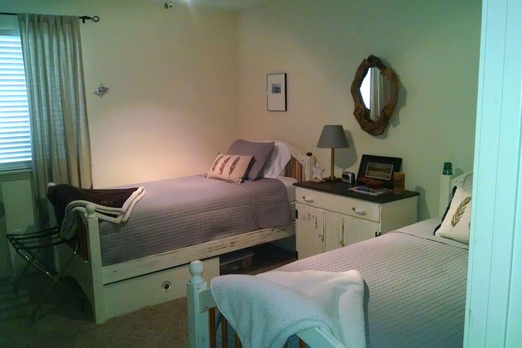 Comfy twin beds, closet, ceiling fan