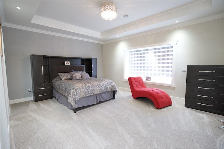 Beautiful Master bedroom with spa tub