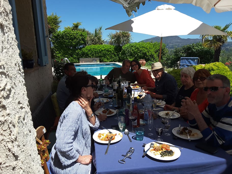 Extended table seats 12 for patio dining with stunning views of mountains the Var valley and coast.