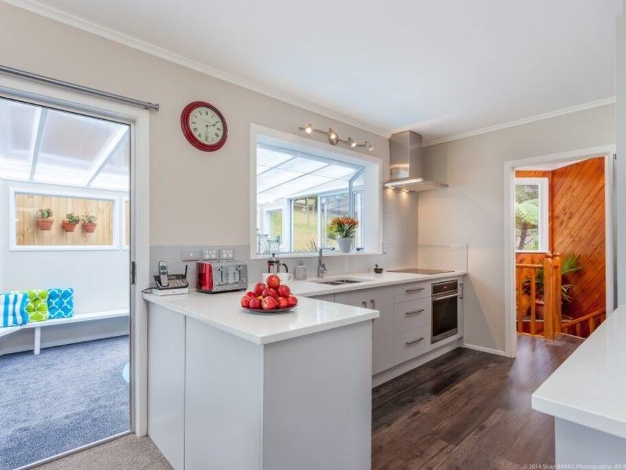 kitchen with door to downstairs