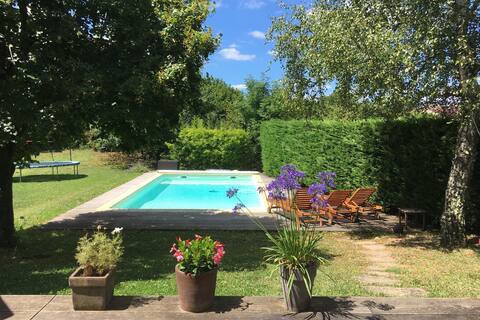 Large architect house with garden and pool.