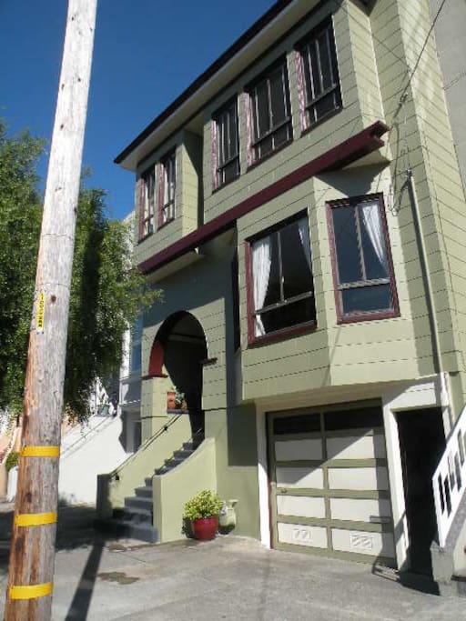 Front of the house. Entrance to private room is next to garage door