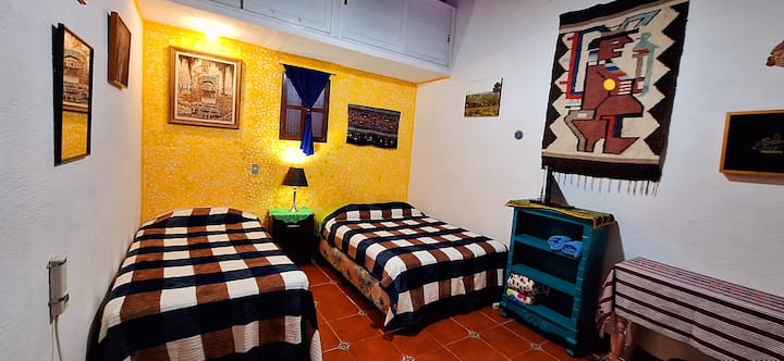 Room #3.  2 beds: 1 double and 1 imperial.  Room for 3 beds maximum. shared bathroom outside the room.

Room #3.  2 beds: 1 marital  and 1 imperial.  Room for 3 beds maximum. Shared bathroom off bedroom