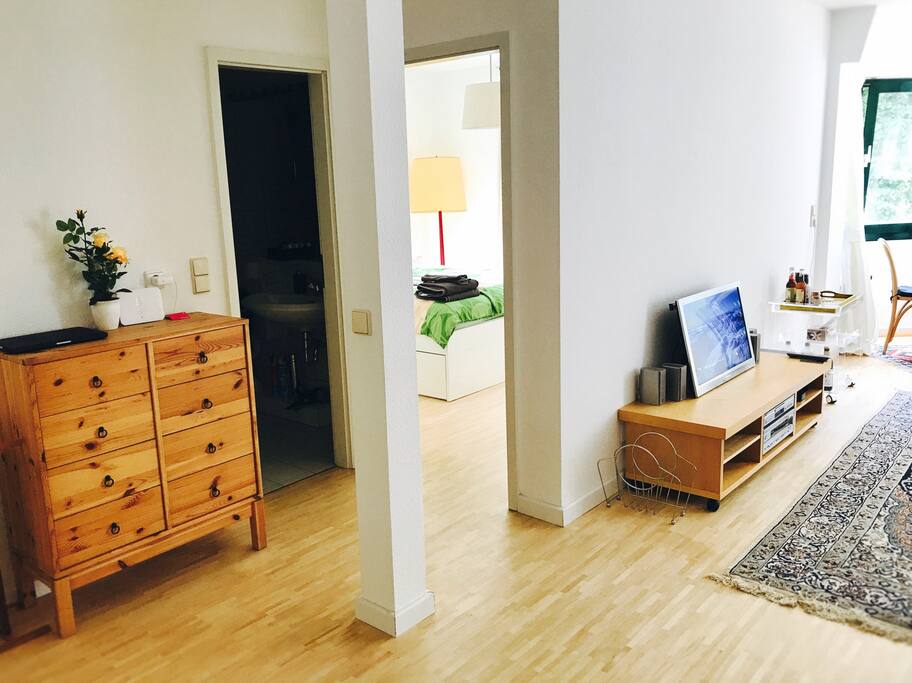 Hall: Bathroom (left), Bedroom (middle), Living room (right)
