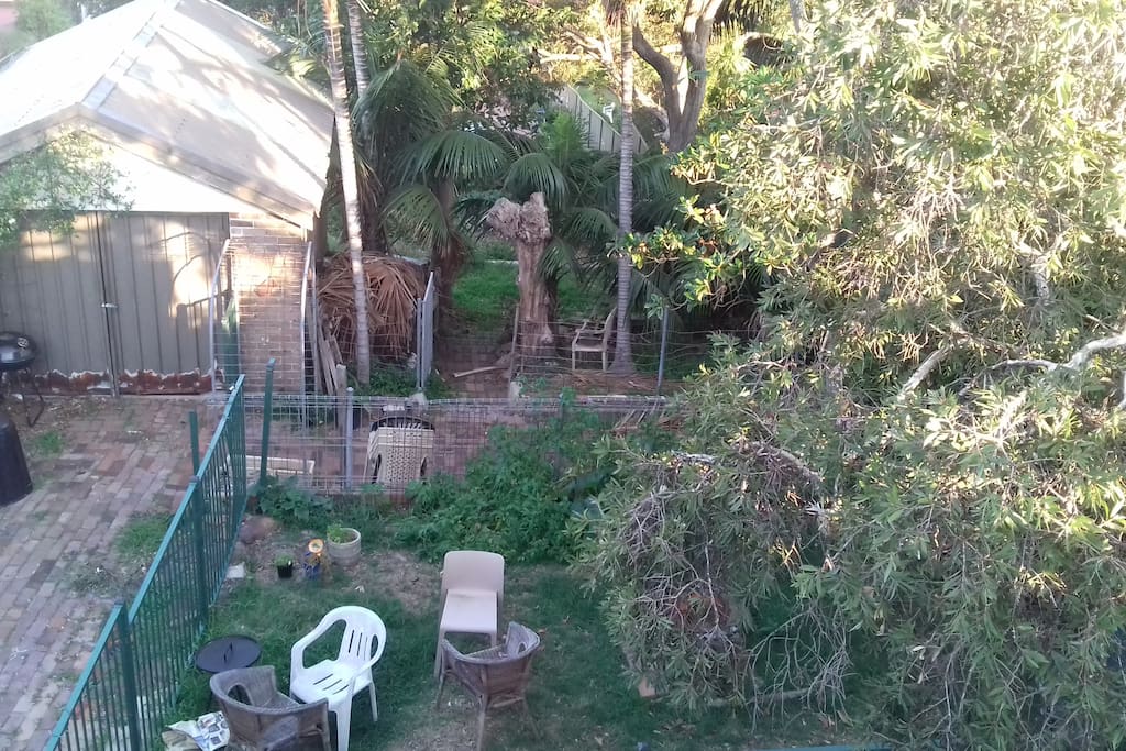 View of the garden from the upstairs terrace area