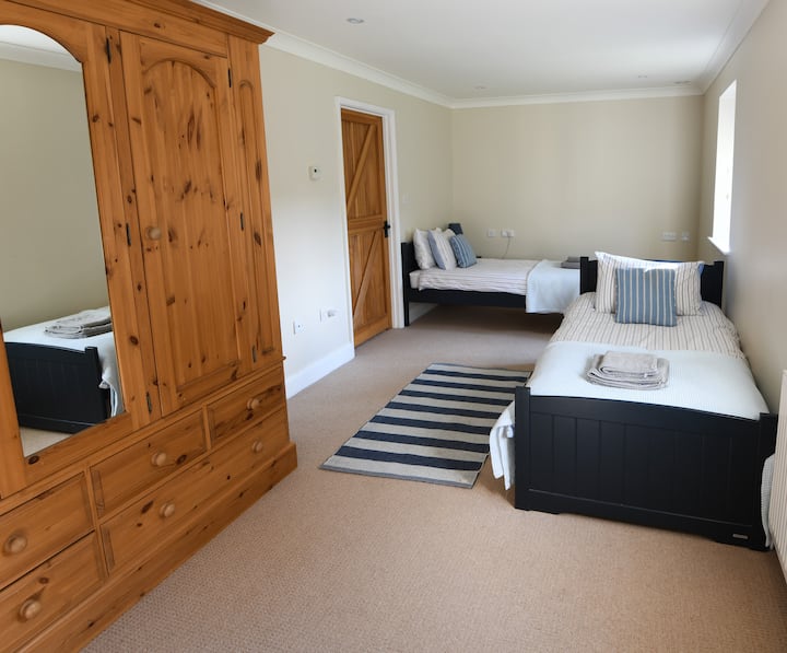 Chambre à deux lits au rez-de-chaussée