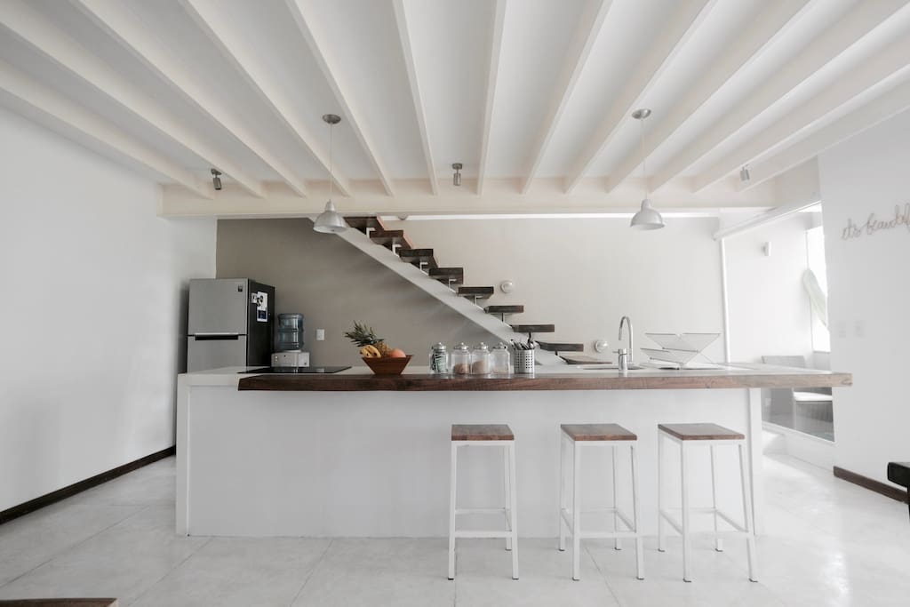 Our modern kitchen is a combination of wood and concrete.