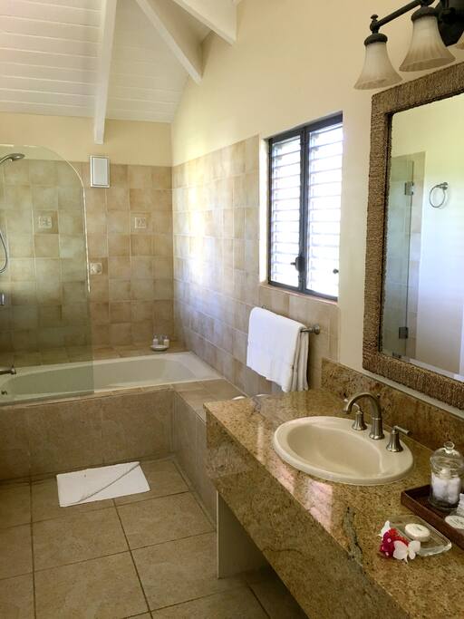 The Upper Premier Junior Suite offers a full bathroom with shower.