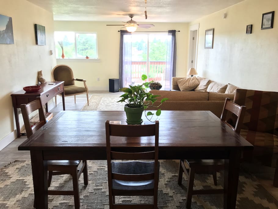 The shared dining and living area gets blasted with gorgeous evening light at sunset