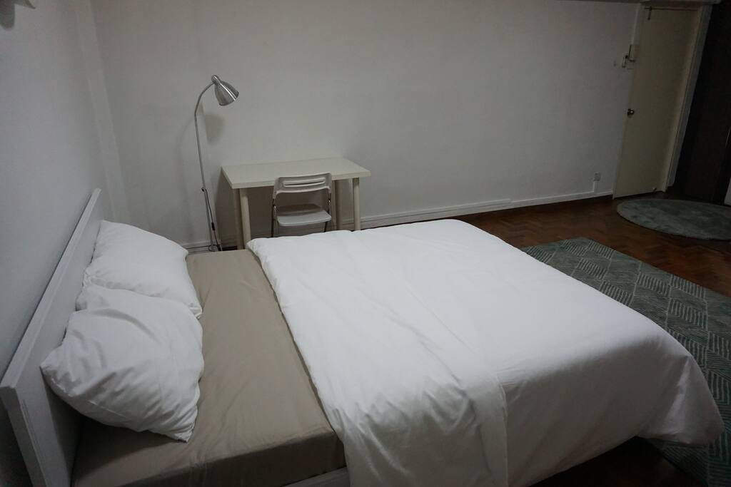 Large room with queen sized bed