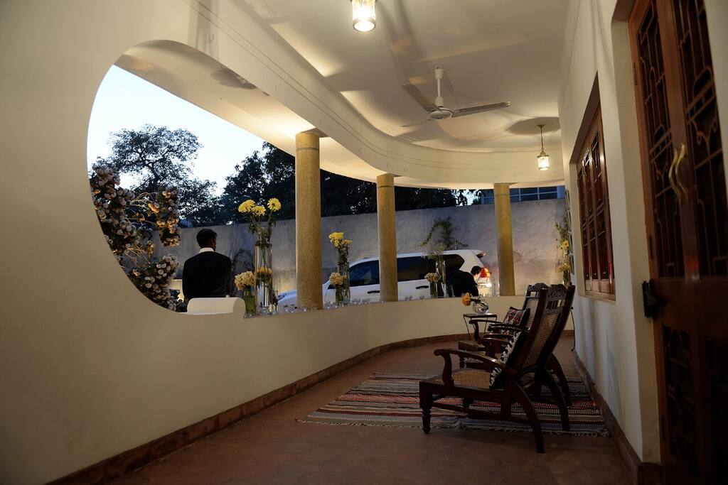 Front Veranda - a beautiful testimony to the timeless beauty of mid-century design. Sit back and enjoy a drink while watching the sunset.
