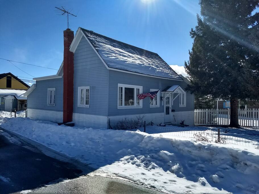 Corner lot with fenced front and back yard.