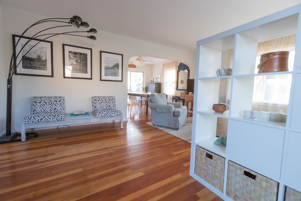 Living Room with view in Dining Room that leads to deck