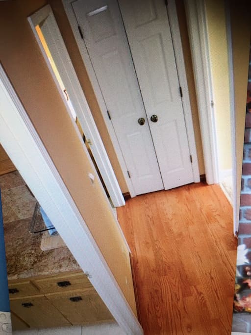 Hallway in the middle with more closets