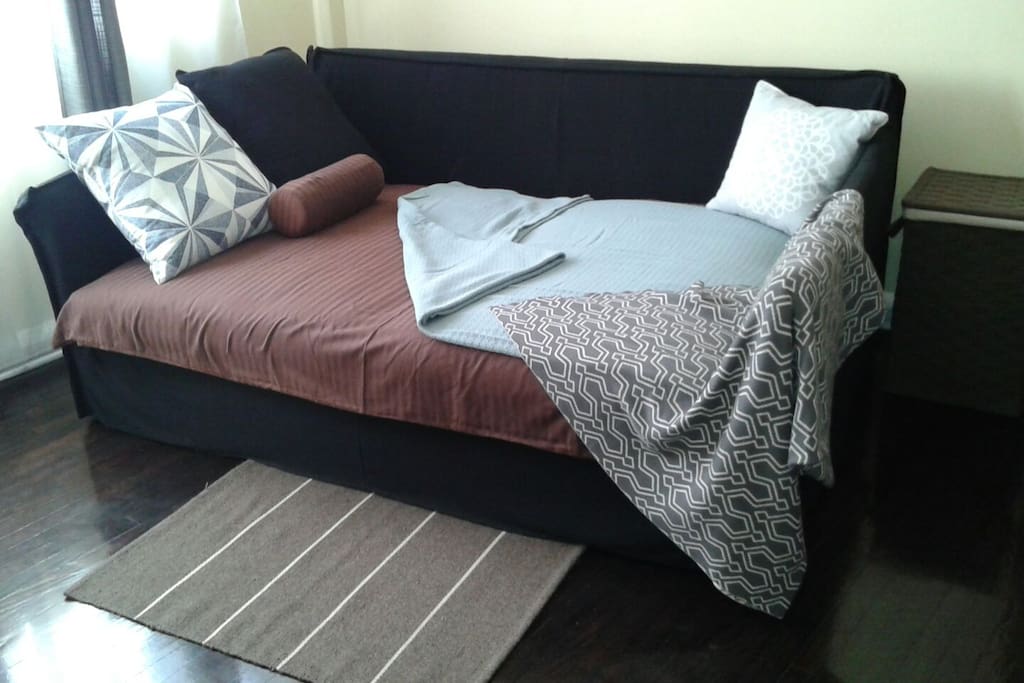 Cozy bed, well illuminated room