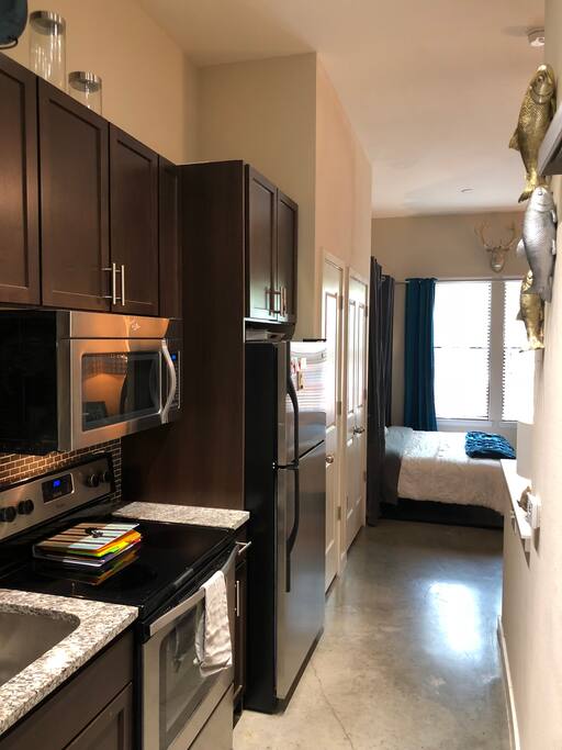 Open concept Kitchen Entryway with dramatic 16' ceilings