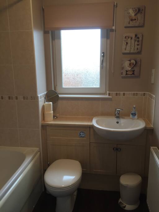Clean, modern bathroom just for guests (we have our own bathroom)