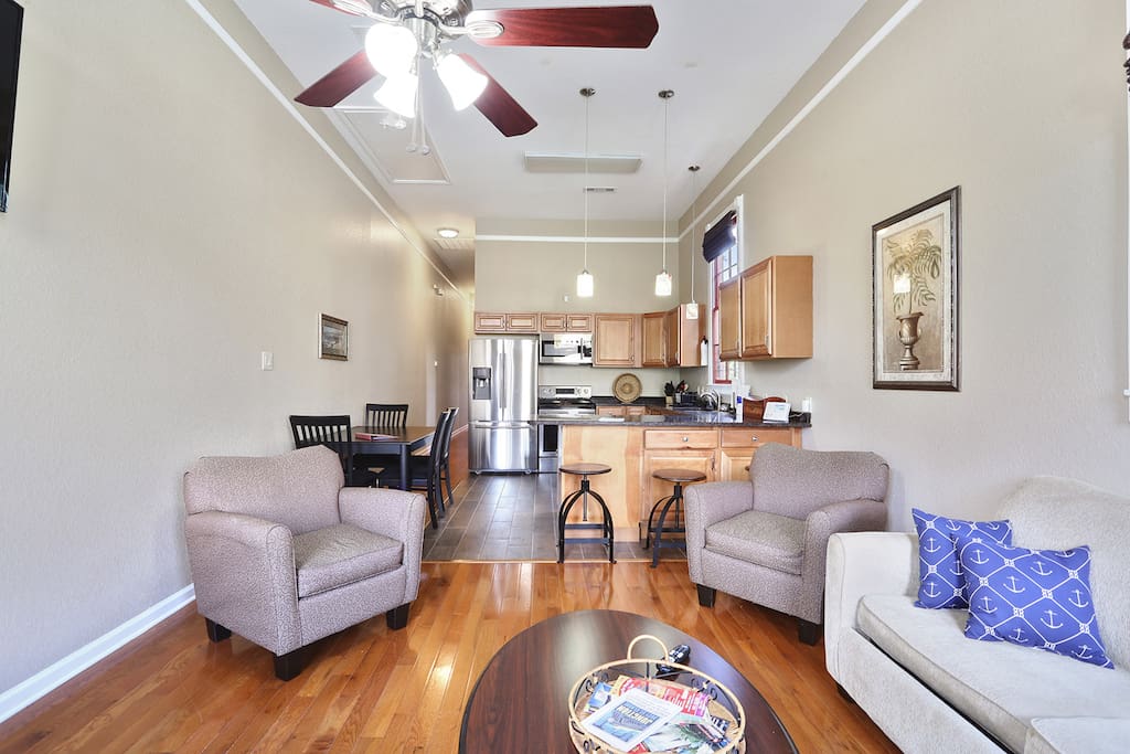 Living Room with sofa sleeper and chairs/Kitchen with appliances /Dinette table with 4 chairs,bar top with 3 barstools