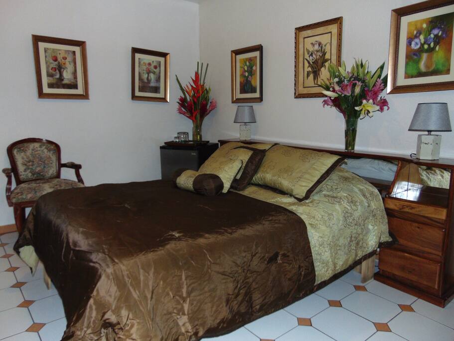 Executive Room #15 has a queen size bed