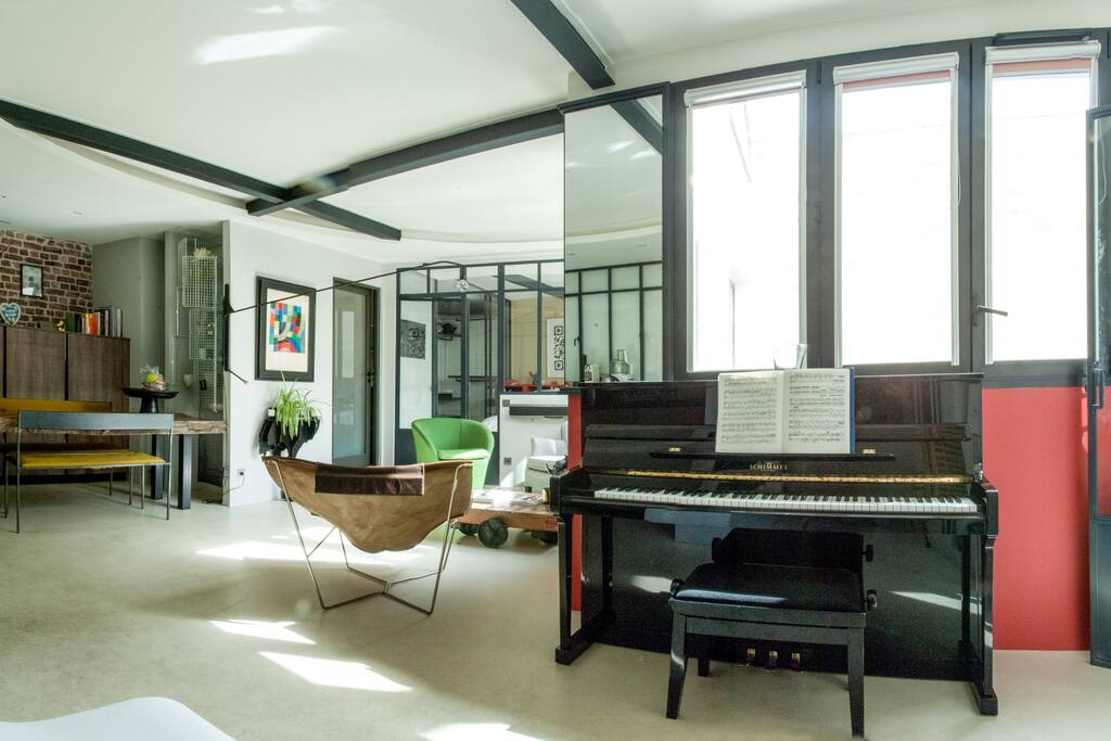 View from the entrance of the apartment with its upright piano