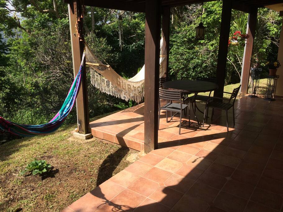 Sun bathe in a relaxing hammock.