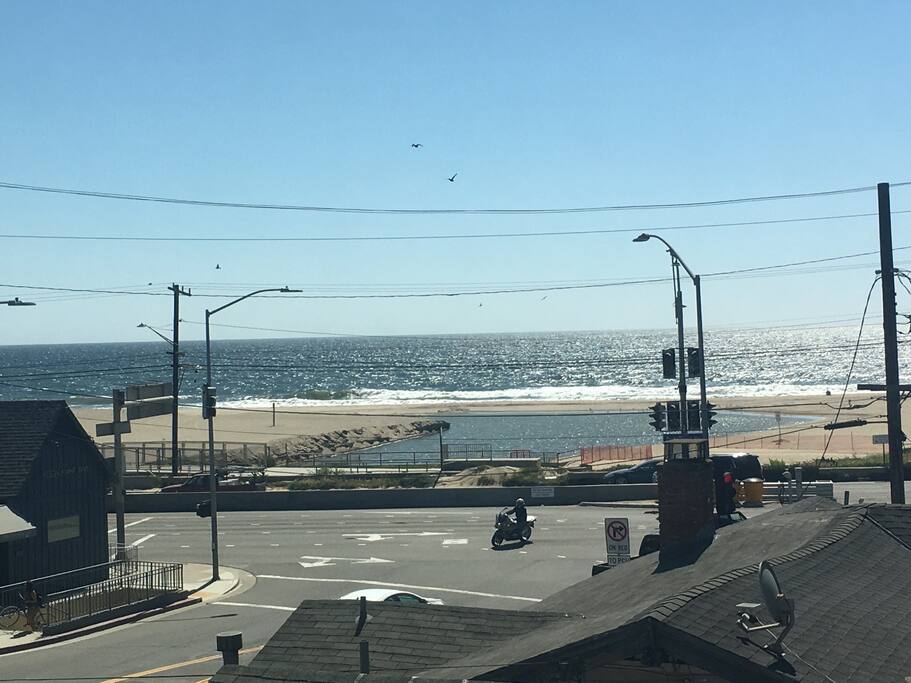 Studio Distance from beach and view from community deck. Note the pedestrians tunnel to beach path to the left in the photo.