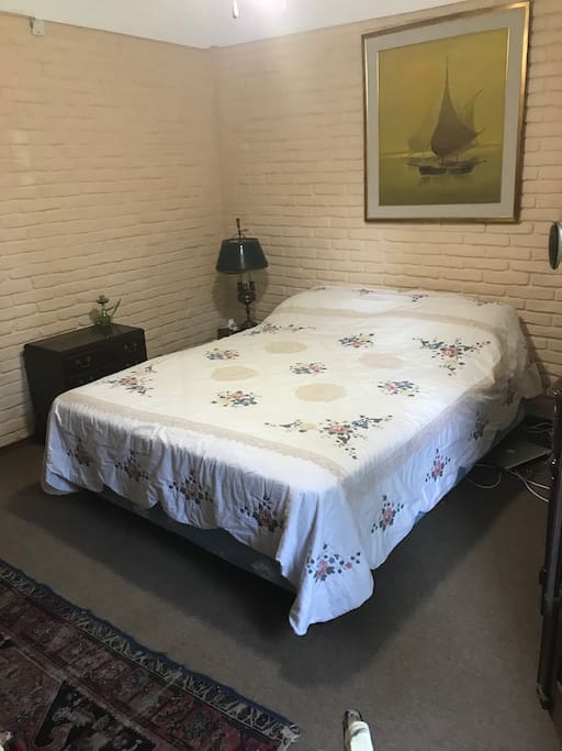 Dormitorio con baño privado