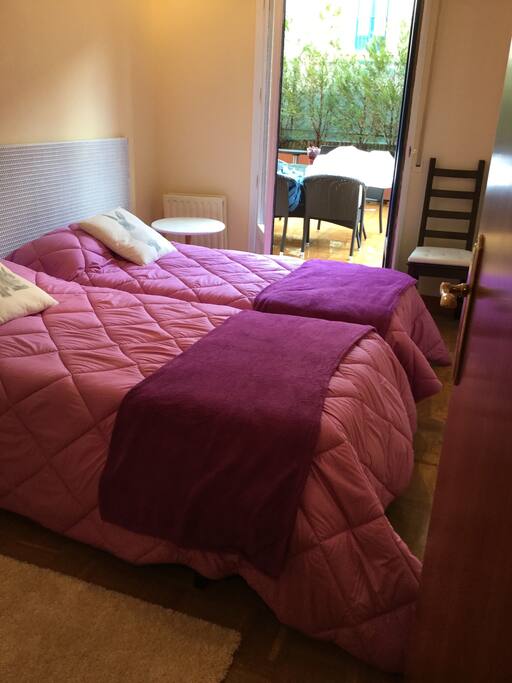 Dormitorio con salida a la terraza