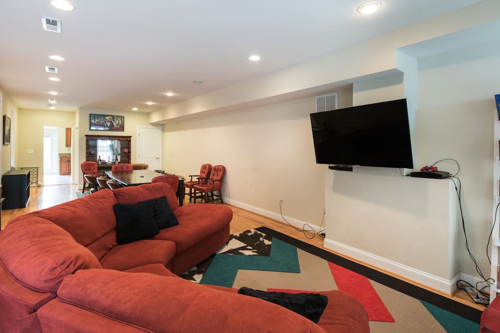Big, open floor plan with living room HD TV, PS3, board games, DVD library, and dining table for 10.