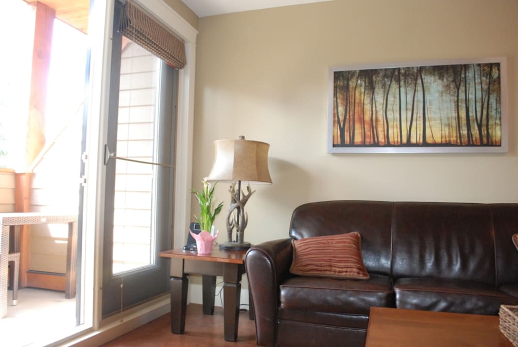 Living room with mountain view and balcony