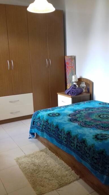 double bed with view to patio