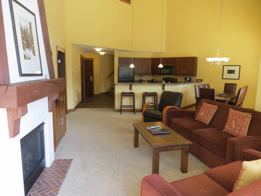 Main floor open concept kitchen, dining room and living area allows for spacious entertaining.