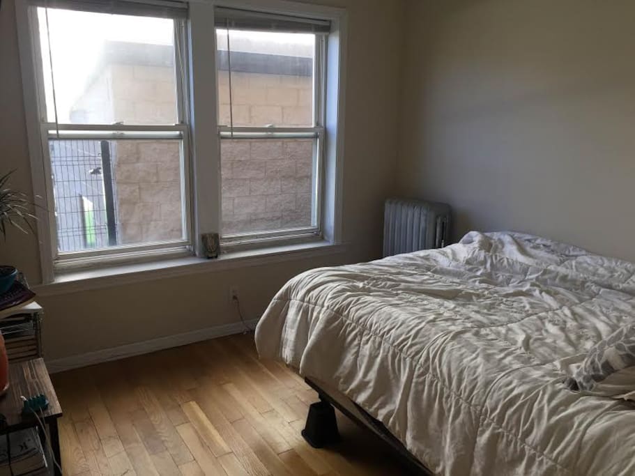 Bedroom - Queen bed and windows (with shades) that open
