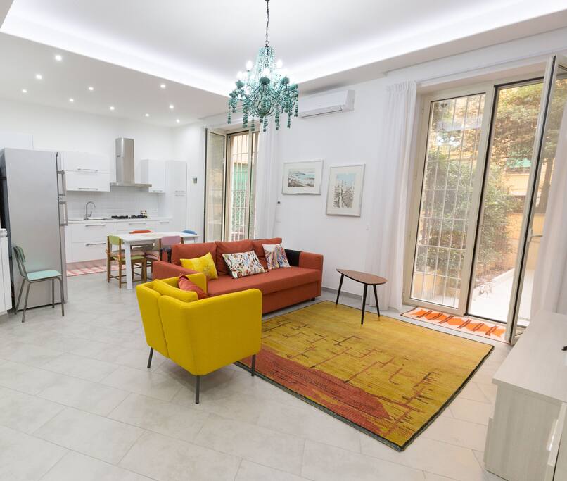 Another panning shot of the apartment - the orange sofa bed (twin size)