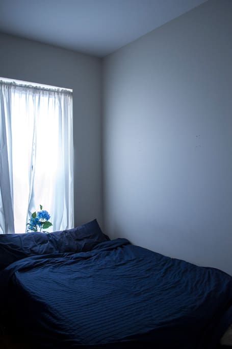 The beautiful full-size bed! Blue just like the ocean, also my favorite color! :D