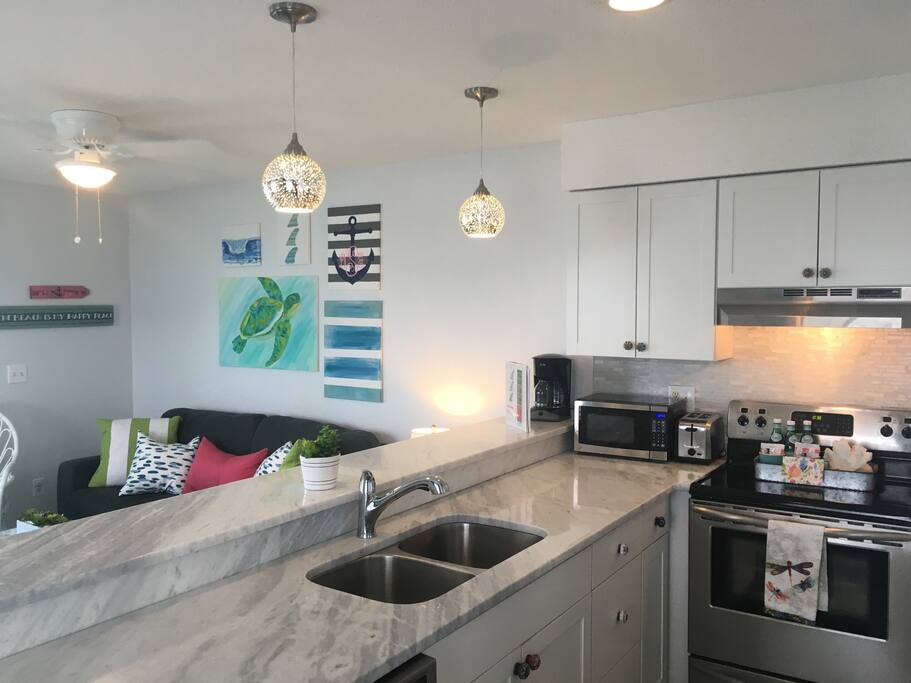 This fresh, bright kitchen has everything you need to prepare a meal or a snack. We even provide coffee.