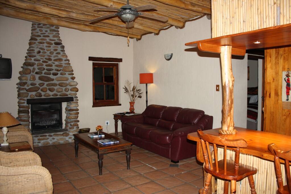 Lounge with built in fireplace, double pull out sleeper & single bed